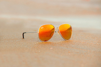 Canva Close up of Rayban Sunglasses